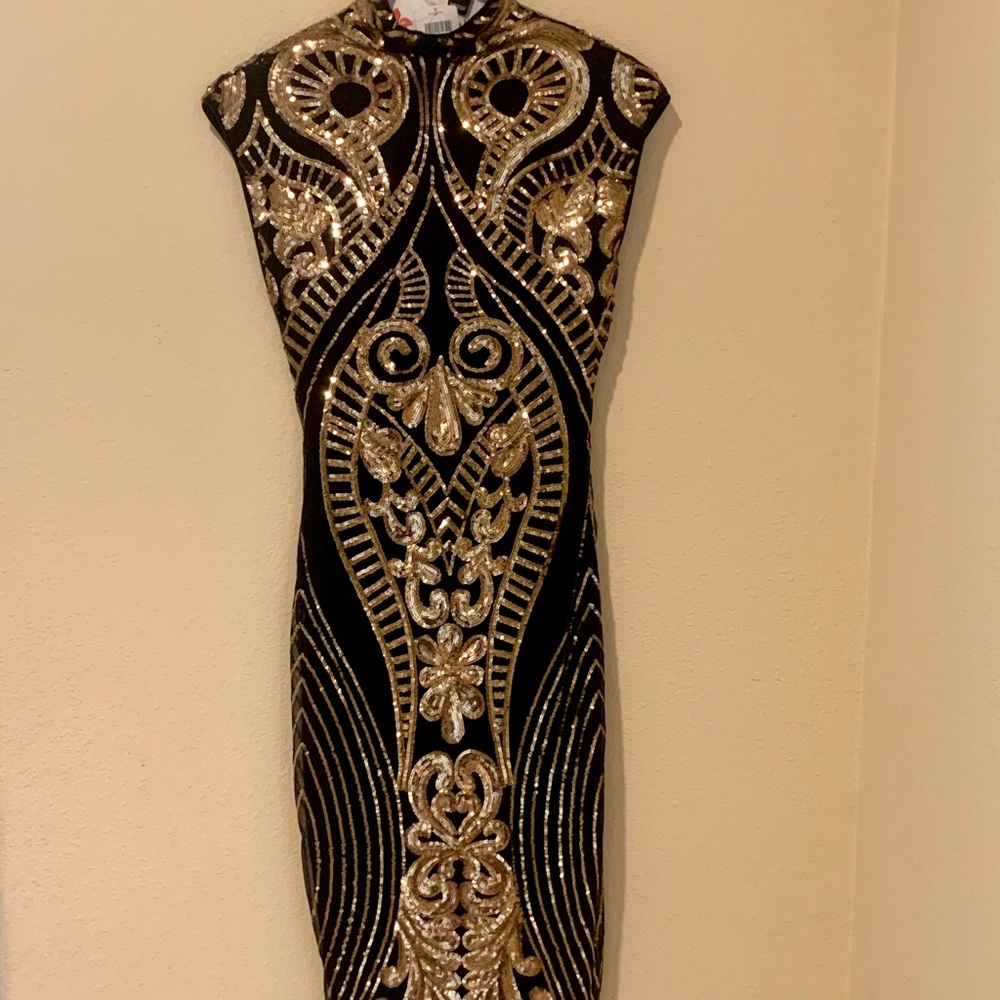 Black and gold sequenced dress